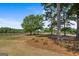 Pasture with trees and wooden fence at 3170 Double Bridges Rd, Rutledge, GA 30663