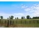 Open pasture with wooden fence and gate at 3170 Double Bridges Rd, Rutledge, GA 30663
