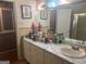 Bathroom with vanity, sink, and mirror at 771 San Fernando Dr, Smyrna, GA 30080