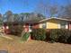 Ranch style home with red brick and yellow accents at 771 San Fernando Dr, Smyrna, GA 30080