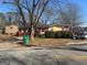 Red brick ranch home with landscaping and driveway at 771 San Fernando Dr, Smyrna, GA 30080