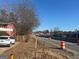 Road view with a home and construction visible at 771 San Fernando Dr, Smyrna, GA 30080