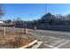 Road view showing road construction and a home in the distance at 771 San Fernando Dr, Smyrna, GA 30080