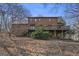 Two-story house with large deck and stone foundation at 2535 Rock Springs Rd, Buford, GA 30519