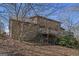Two-story home with elevated deck and wooded setting at 2535 Rock Springs Rd, Buford, GA 30519