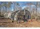 Unique Quonset hut structure in a wooded setting at 2535 Rock Springs Rd, Buford, GA 30519