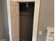 Bedroom closet with hanging rod and shelving for convenient storage at 1771 Ware Ave, East Point, GA 30344