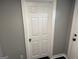 Hallway door with classic white paneling at 1771 Ware Ave, East Point, GA 30344