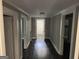 Hallway leading to a bright doorway with doors on either side at 1771 Ware Ave, East Point, GA 30344