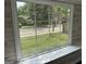 Room view with a large window view of the yard and shiplap walls at 1771 Ware Ave, East Point, GA 30344