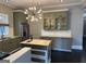 Modern kitchen with green cabinets, stainless steel appliances, and island at 1771 Ware Ave, East Point, GA 30344