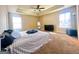 Main bedroom with carpeted floor and ceiling fan at 11958 Quail Dr, Hampton, GA 30228
