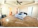 Main bedroom with en-suite bathroom and ample space at 11958 Quail Dr, Hampton, GA 30228