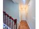 Bright entryway with hardwood floors and staircase at 11958 Quail Dr, Hampton, GA 30228