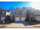 Two-story brick home with two-car garage and landscaping at 11958 Quail Dr, Hampton, GA 30228