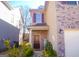 Two-story home with dark brown door and landscaping at 11958 Quail Dr, Hampton, GA 30228