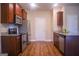 Kitchen with stainless steel appliances and wood cabinets at 11958 Quail Dr, Hampton, GA 30228