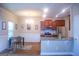 Kitchen with hardwood floors and stainless steel appliances at 11958 Quail Dr, Hampton, GA 30228