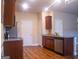 Modern kitchen with stainless steel appliances and granite countertops at 11958 Quail Dr, Hampton, GA 30228