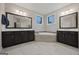 Luxurious bathroom with double vanity, soaking tub, and separate shower at 200 Jamestowne Pass, Peachtree City, GA 30269