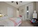 Bright bedroom with a comfortable bed, and access to a private balcony at 200 Jamestowne Pass, Peachtree City, GA 30269