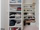 Organized closet with shelving for shoes and clothes storage at 200 Jamestowne Pass, Peachtree City, GA 30269