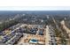 Aerial view of community, including pool and green space at 200 Jamestowne Pass, Peachtree City, GA 30269