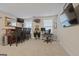 Game room with bar, instruments and seating area at 200 Jamestowne Pass, Peachtree City, GA 30269