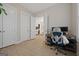 Home office with hardwood floors and built-in shelving at 200 Jamestowne Pass, Peachtree City, GA 30269