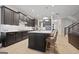 Modern kitchen with large island, stainless steel appliances, and white cabinets at 200 Jamestowne Pass, Peachtree City, GA 30269