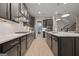 Open concept kitchen with stainless steel appliances and large island at 200 Jamestowne Pass, Peachtree City, GA 30269