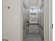 Walk-in shower with gray tile and glass enclosure at 200 Jamestowne Pass, Peachtree City, GA 30269