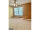 Bedroom with carpet, ceiling fan, and large window at 2567 Laurel Nw Cir, Atlanta, GA 30311