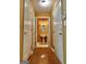 Hallway with wood floors and view of half bathroom at 2567 Laurel Nw Cir, Atlanta, GA 30311