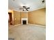 Spacious living room with fireplace, neutral walls, and carpet flooring at 2567 Laurel Nw Cir, Atlanta, GA 30311