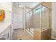 Clean bathroom with walk-in shower and neutral tile at 361 Elkins Pl, Peachtree City, GA 30269