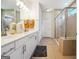 Modern bathroom with double vanity and walk-in shower at 361 Elkins Pl, Peachtree City, GA 30269