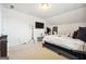 Bright bedroom with queen bed and plenty of space for additional furniture at 361 Elkins Pl, Peachtree City, GA 30269