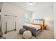 Comfortable bedroom with a full-size bed and cozy accents at 361 Elkins Pl, Peachtree City, GA 30269