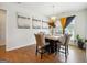 Bright dining area with hardwood floors and natural light at 361 Elkins Pl, Peachtree City, GA 30269