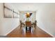 Elegant dining room with hardwood floors and neutral color palette at 361 Elkins Pl, Peachtree City, GA 30269