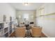 Spacious home office featuring hardwood floors and stylish decor at 361 Elkins Pl, Peachtree City, GA 30269