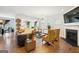 Spacious living area with hardwood floors and fireplace at 361 Elkins Pl, Peachtree City, GA 30269
