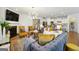 Open concept living room with kitchen view and modern decor at 361 Elkins Pl, Peachtree City, GA 30269