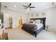 Spacious main bedroom with king bed and en-suite bath at 361 Elkins Pl, Peachtree City, GA 30269