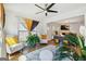 Bright sunroom with comfortable seating and access to the living room at 361 Elkins Pl, Peachtree City, GA 30269