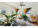 Relaxing sunroom with hardwood floors and access to backyard at 361 Elkins Pl, Peachtree City, GA 30269