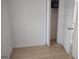 Bright bedroom with wood flooring and closet at 41 W Main St, Hampton, GA 30228