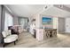 A bedroom with a crib, pink mini-refrigerator, gray curtains, and a TV on a stand at 107 Stratford Ct, Peachtree City, GA 30269