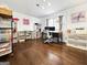 Home office with hardwood floors, ample storage space, and a large desk area at 107 Stratford Ct, Peachtree City, GA 30269